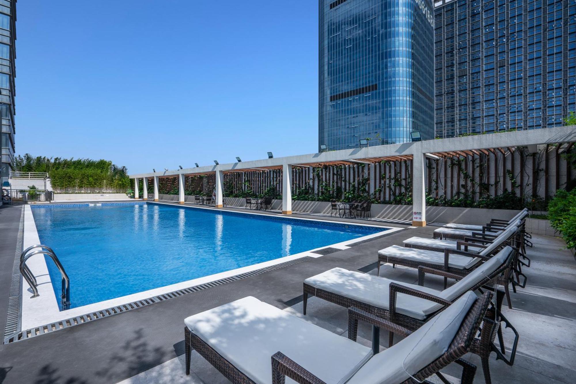 Pearl River International Hotel - Canmetro Line 11 Yijing Lu Station Гуанчжоу Экстерьер фото